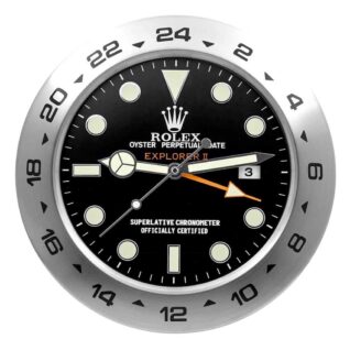 Rolex Explorer II wall clock featuring a black dial, brushed stainless steel 24-hour bezel, luminous markers, date window, and an orange GMT hand.