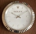 An ROLEX INSPIRED WALL CLOCK - OYSTER - RL-66 with the word ROLEX on it.