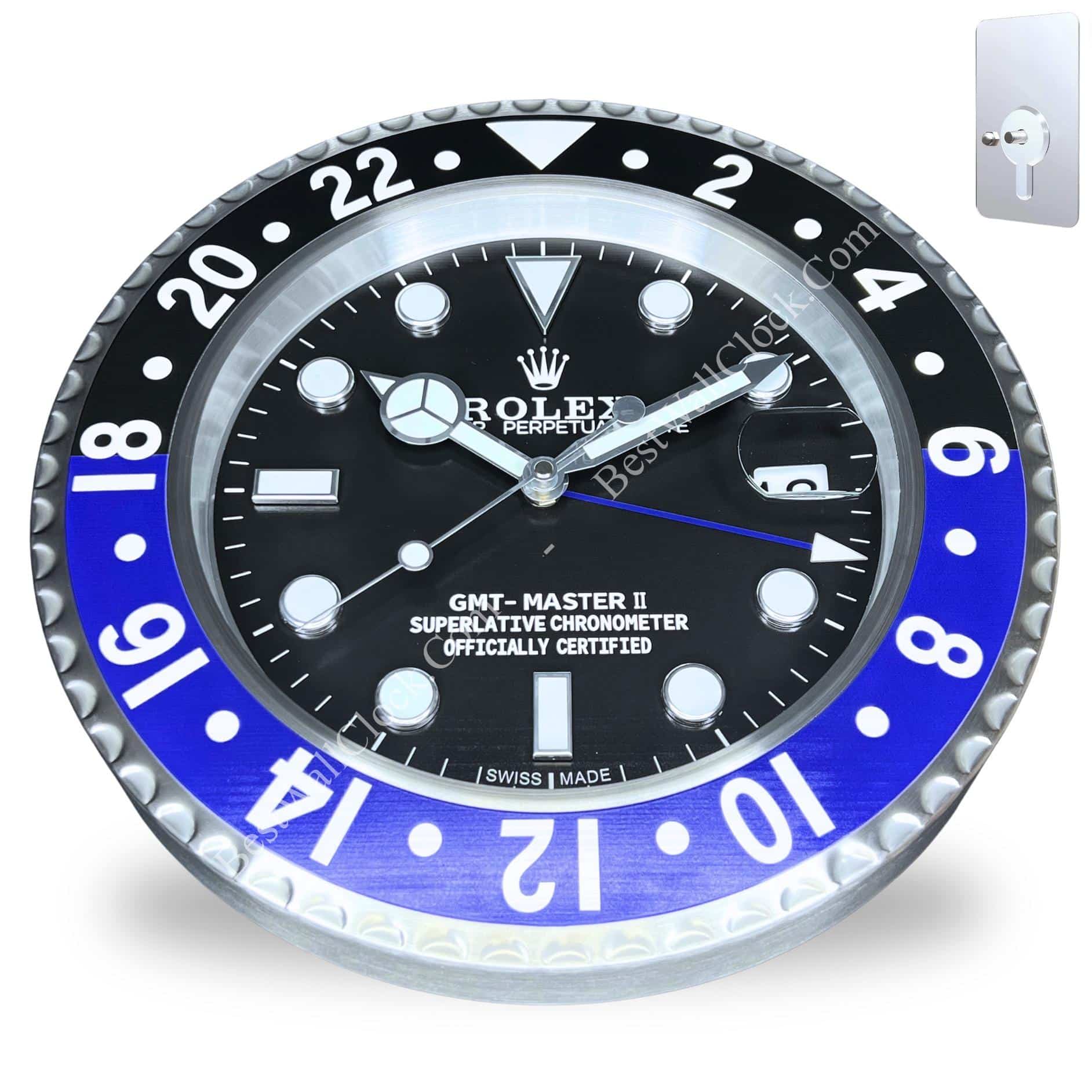 Round wall clock designed like a Rolex GMT-Master II watch face with a black and blue bezel, luminous markers, and a small date window with a keyhole lock visible in the top right corner.