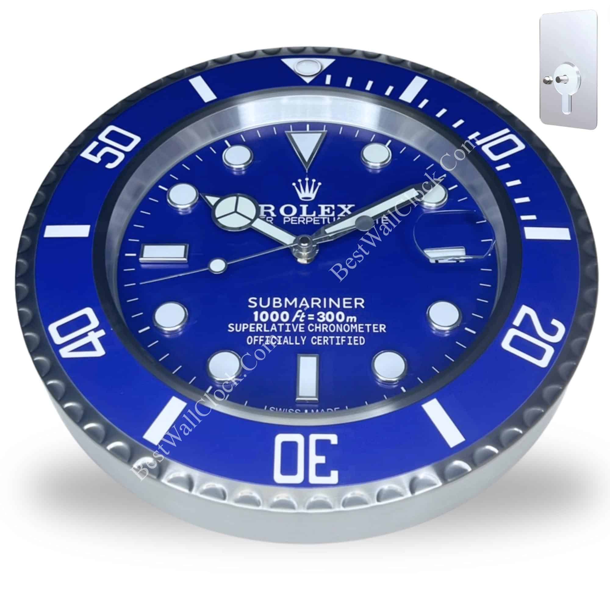 rolex wall clock designed to resemble a blue Submariner watch face with luminous markers and silver trim