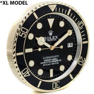 A Rolex Submariner wall clock with a black dial, gold accents, decorative bezel, Mercedes-style hands, date window, and Cyclops lens.