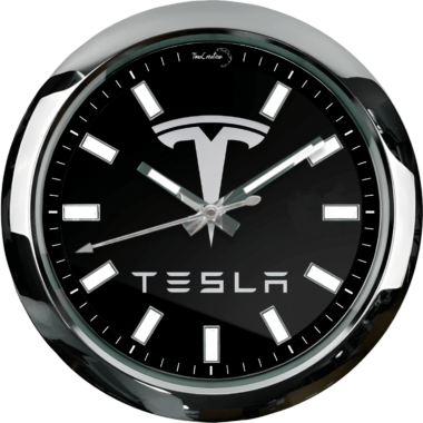 The Tesla Wall Clock is displayed on a black wall.