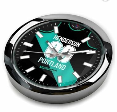 A PORTLAND TRAIL BLAZERS Henderson Basketball wall Clock with a green and white logo featuring the PORTLAND TRAIL BLAZERS.