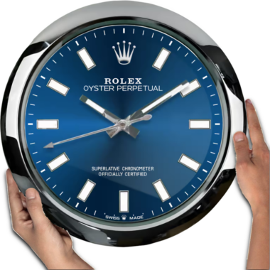 A person is holding an oversized representation of an Oyster Perpetual - Blue wristwatch.