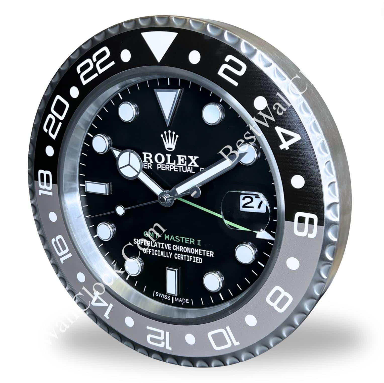 Rolex wall clock designed to resemble a Rolex GMT Master II watch face with black dial, white hour markers, date window, and a silver and black bezel with 24-hour markings