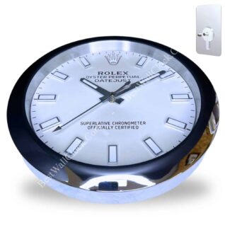 Wall clock designed to resemble a Rolex Oyster Perpetual Datejust watch face with silver frame and black hour markers on a white background, showing time at approximately 10:10:40.