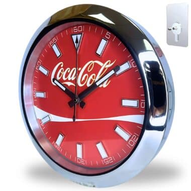 Wall-mounted round clock with a shiny silver frame and a red face featuring the Coca-Cola logo and white hour markers, showing the time as 10:10:00, with a separate image of a keyhole wall mount.