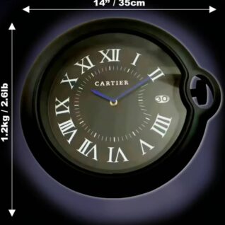 Rolex wall clock styled like a Cartier wristwatch with Roman numerals, measuring 14 inches (35 cm) in diameter and weighing 1.2 kg (2.6 lb) against a dark background.