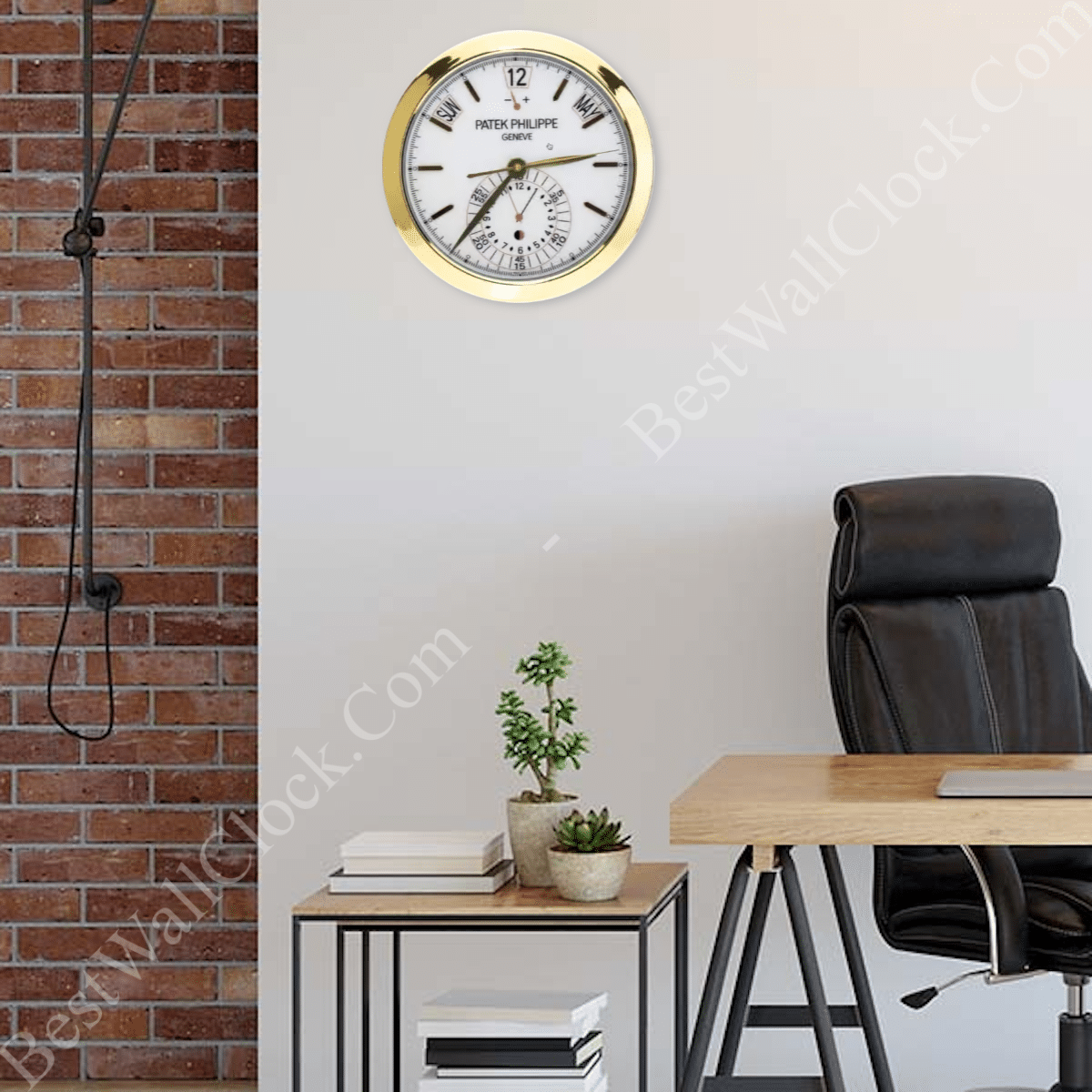 Rolex well clock showing a Patek Philippe wall clock with a gold frame above a modern desk setup featuring a black office chair, a small table with potted plants and books, and a brick wall on the left