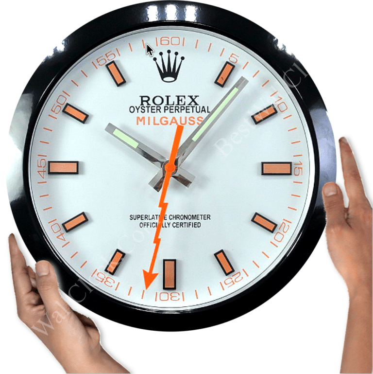 Rolex well clock showing a close-up of a white dial Rolex Oyster Perpetual Milgauss wall clock with orange and black hour marks and hands, held by two hands on either side