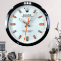 rolex well clock featuring a wall clock styled like a Rolex Milgauss watch face with orange and black markers and lightning bolt second hand above a wooden surface with decorative objects