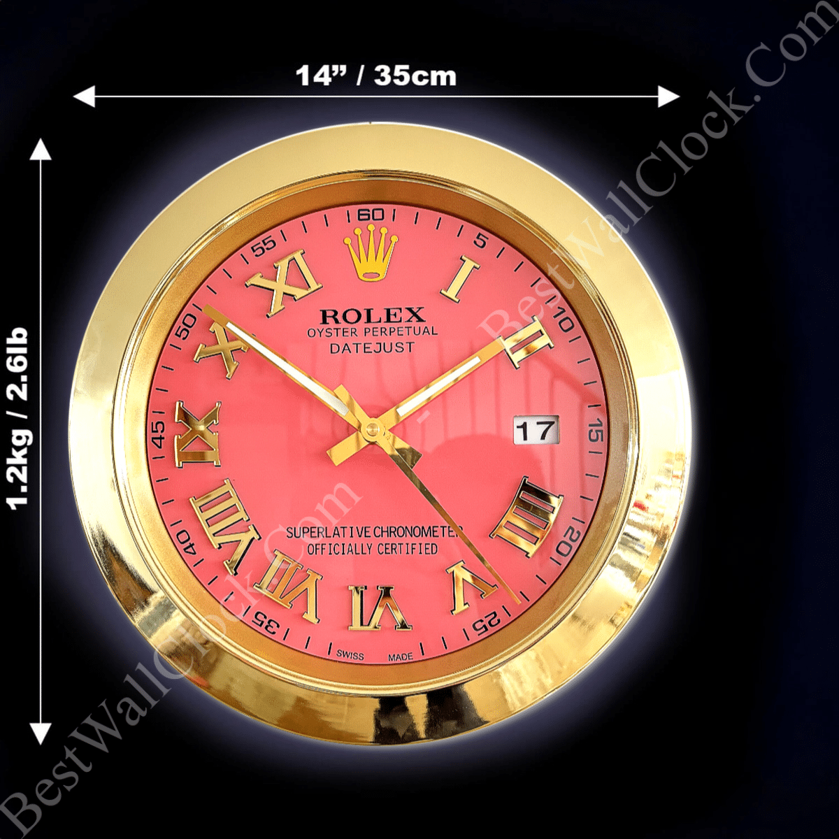 Gold-framed Rolex Datejust wall clock with a red face, gold Roman numerals, and a date display showing the 17th, measuring 14 inches (35 cm) in diameter and weighing 1.2 kg (2.6 lb)