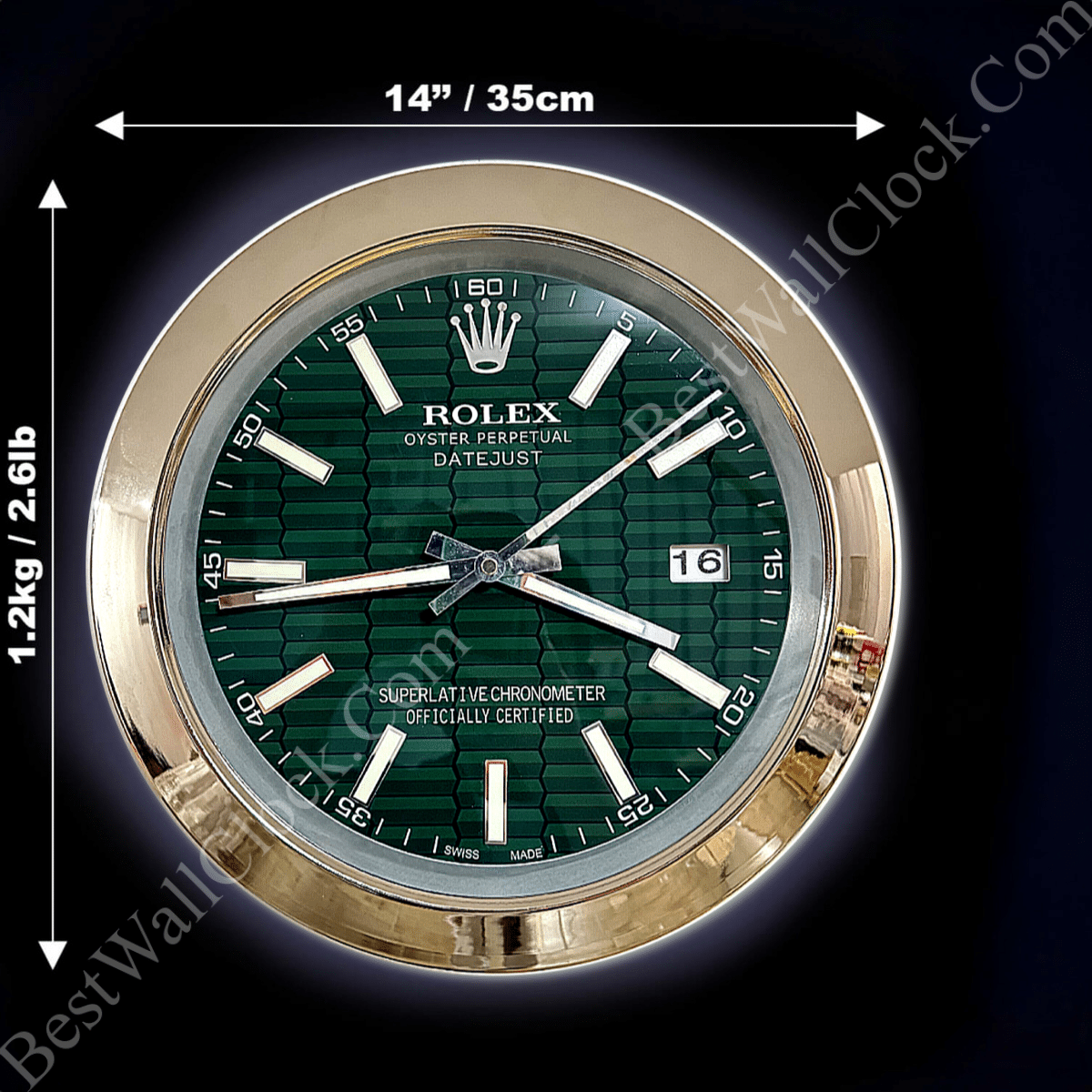 Round wall clock designed like a Rolex Oyster Perpetual Datejust watch face with a green textured background, gold frame, and white hour markers and hands, measuring 14 inches (35 cm) in diameter and weighing 1.2 kg (2.6 lb).