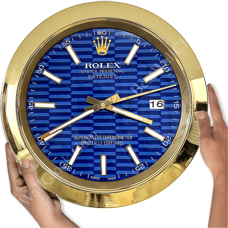 Wall clock designed like a Rolex Datejust watch with a blue patterned face, gold frame, gold hour and minute hands, and white hour markers showing the time as approximately 4:38.