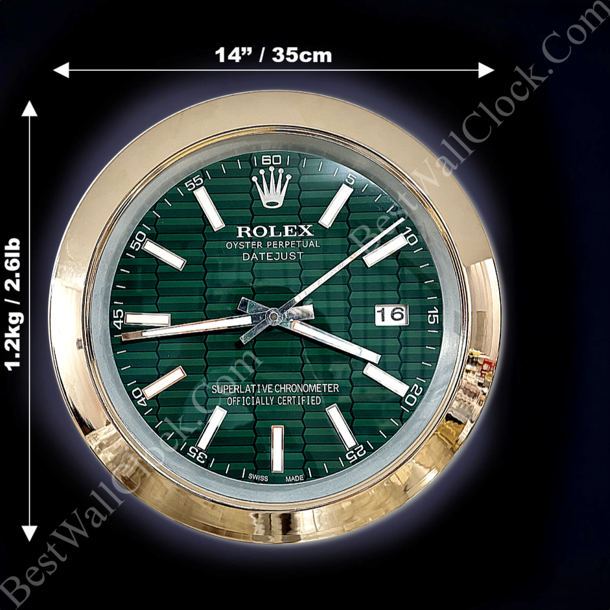 Round wall clock designed like a Rolex Oyster Perpetual Datejust watch with a gold frame, green patterned face, white hour markers, and date display showing 16, measuring 14 inches or 35 cm in diameter and weighing 1.2 kg or 2.61 lbs.