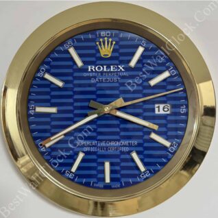 Gold-framed Rolex clock with a blue textured face displaying hour, minute, and second hands, a date window showing 16, and white rectangular hour markers.