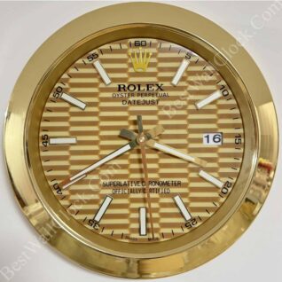 Gold-toned Rolex Oyster Perpetual Datejust wall clock with hexagonal patterned face, white hour markers, date window showing 16, and gold bezel.