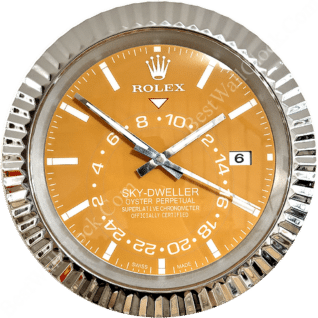 Rolex Sky-Dweller watch face with a gold dial, silver hour markers and hands, date window at 3 o'clock, surrounded by a fluted silver bezel