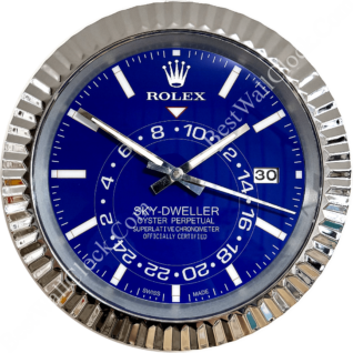 Close-up view of a Rolex Sky-Dweller wristwatch face with a blue dial, white hour markers, silver hands, date window at 3 o'clock, and a textured silver bezel