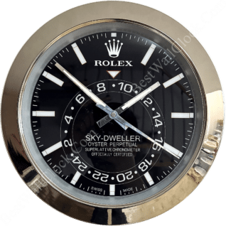 Round Rolex Sky-Dweller wristwatch face with black dial, silver hour markers and hands, displaying additional 24-hour time markings, encased in reflective silver bezel.