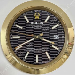 rolex well clock with a gold frame, black patterned face, gold hour markers, and date display at 3 o'clock