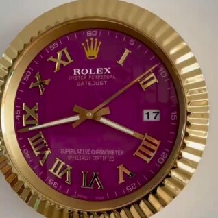 Close-up of a Rolex Oyster Perpetual Datejust clock with a gold bezel and purple face, featuring Roman numeral hour markers, gold hour and minute hands, a white second hand, and a date display showing the 17th.