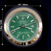Rolex Oyster Perpetual Day-Date wall clock with a green face and silver hands, displaying the day terça-feira and the date 26, with dimensions 14 inches (35 cm) in diameter and 1.2 kg (2.61 lb) weight indicated.
