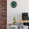 Modern office corner with a black leather chair, wooden desk, side table with potted plants and books, and a wall clock with a green Rolex dial displaying terça-feira the 26th against a white and brick wall background