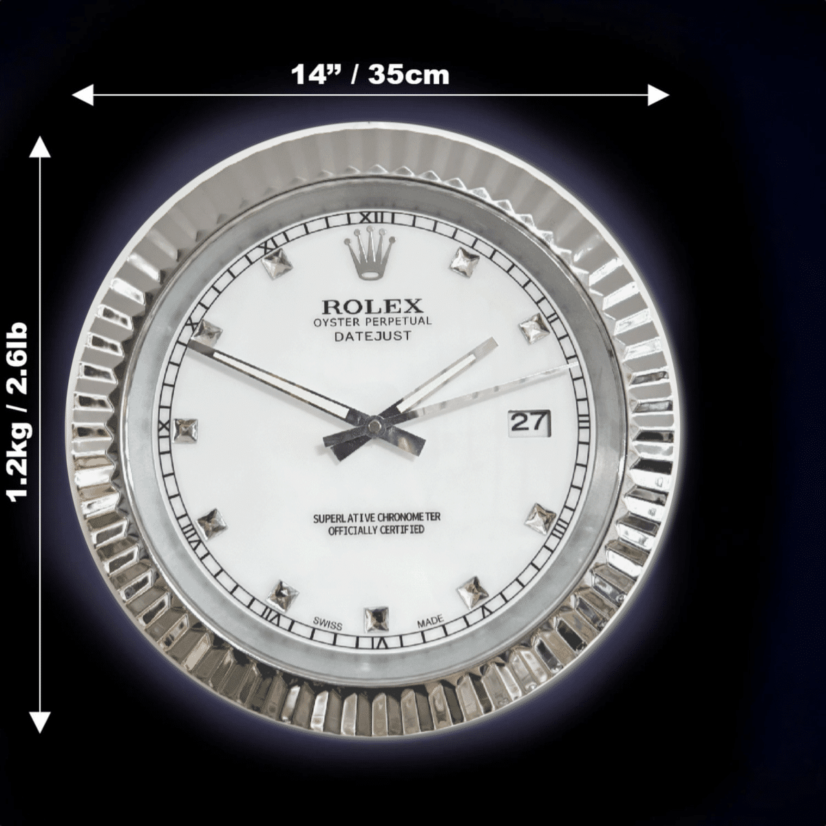 Round Rolex Oyster Perpetual Datejust wall clock with silver fluted bezel, white dial, roman numerals, diamond hour markers, and date display at 3 o'clock, measuring 14 inches (35 cm) in diameter and weighing 1.2 kg (2.61 lb).