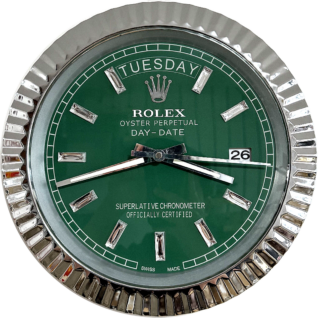 Close-up of a green Rolex Oyster Perpetual Day-Date watch face with silver hour markers, showing the day as Tuesday and the date as 26, encased in a reflective silver fluted bezel.