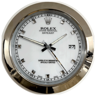 Close-up of a Rolex Oyster Perpetual Datejust watch face with silver diamond-shaped hour markers, Roman numerals around the edge, a date window showing "27", and silver watch hands indicating the time as 9:51:24.