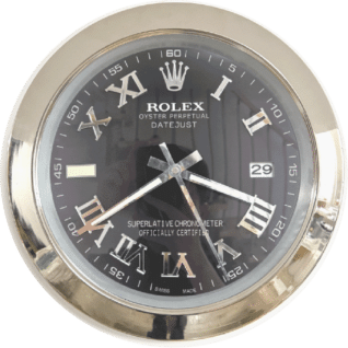 Round Rolex Oyster Perpetual Datejust clock with a black face, silver Roman numerals, silver hands, date display at 3 o'clock, and a reflective silver bezel.