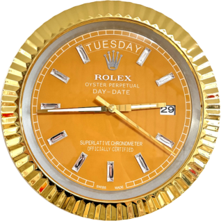 Close-up of a gold Rolex Oyster Perpetual Day-Date watch face with diamond hour markers, showing Tuesday and the date 29