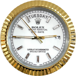 Close-up of a Rolex Oyster Perpetual Day-Date watch face with a gold bezel, white dial, diamond hour markers, displaying Martedì and the date 17, and gold hour, minute, and second hands.