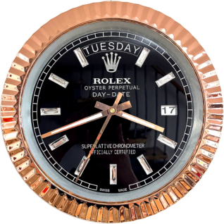 Close-up of a Rolex Oyster Perpetual Day-Date watch with a black dial, diamond hour markers, rose gold fluted bezel, displaying the day Tuesday and date 17